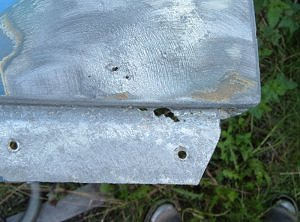 Holes in front aluminium wing